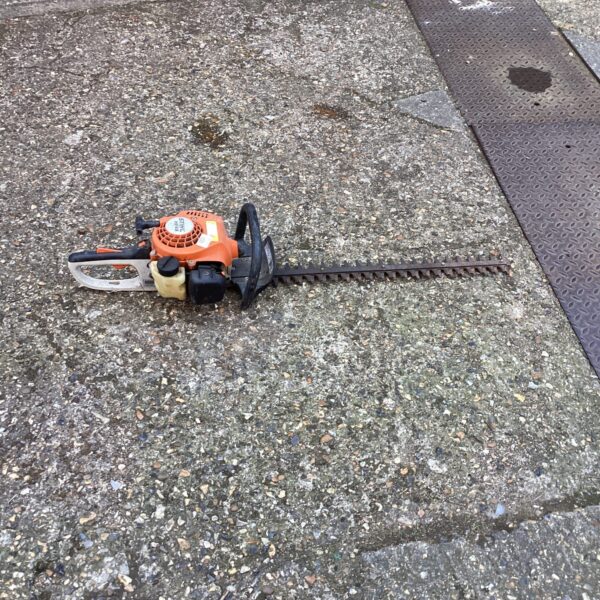 Used Stihl HS45 hedge cutter for garden maintenance.