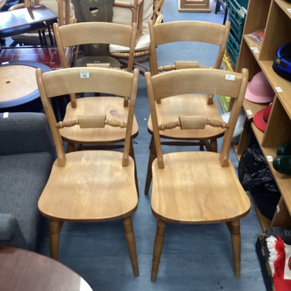 Set of four vintage wooden bar back dining chairs.
