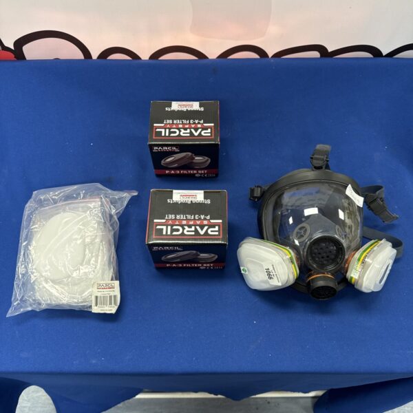 3M dust mask with spare filters and pads for industrial safety.
