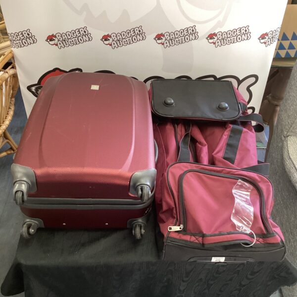 Wheeled suitcases and sports holdall by Trespass and Eminent.