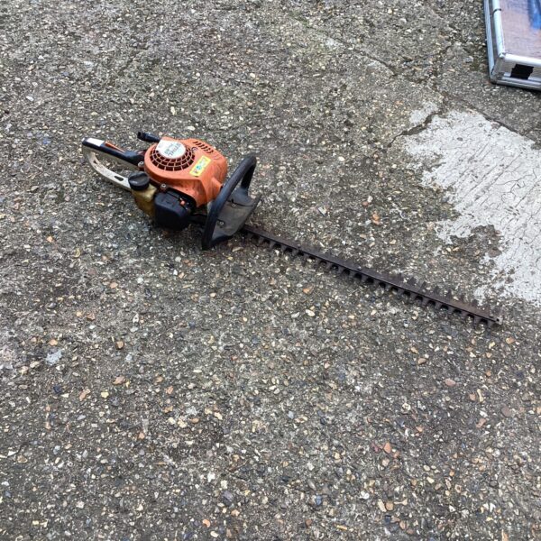 Used Stihl HS45 hedge cutter for garden maintenance.
