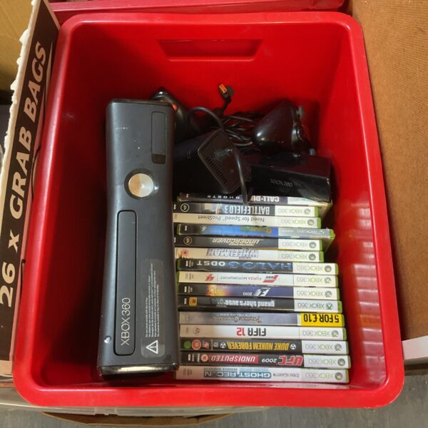 Microsoft Xbox 360 console with included games for retro gaming.