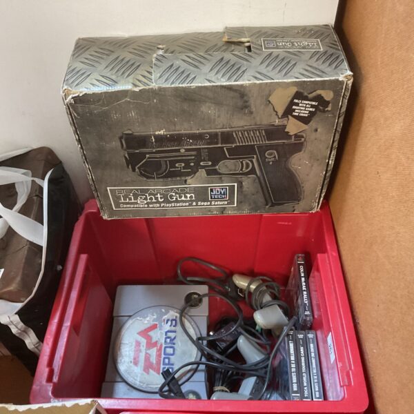 Vintage Sega light gun for Saturn console, retro gaming accessory.