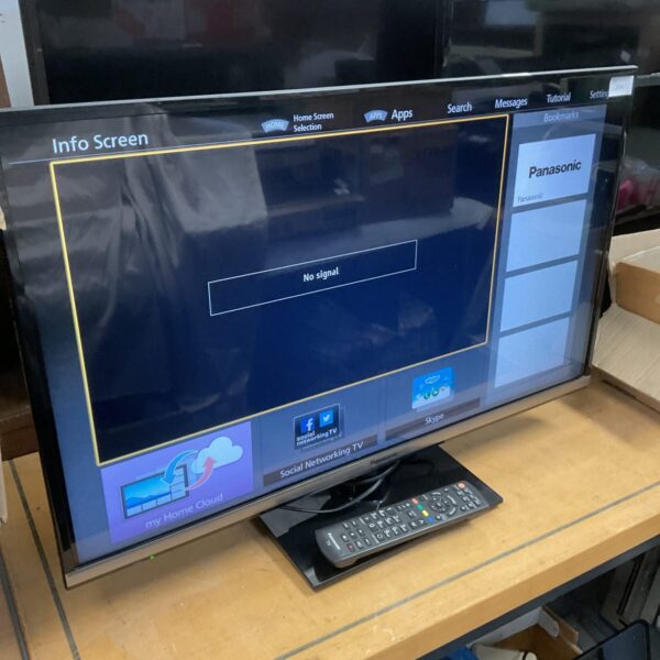 Panasonic 32 inch LCD smart TV with remote control.