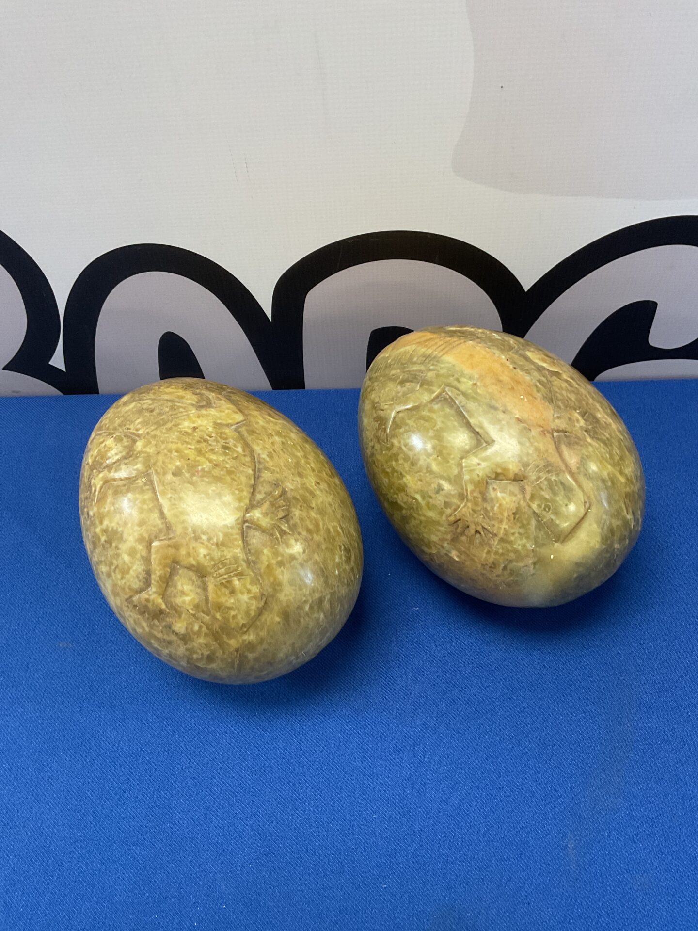 264 Pair of carved soap stone lizard eggs