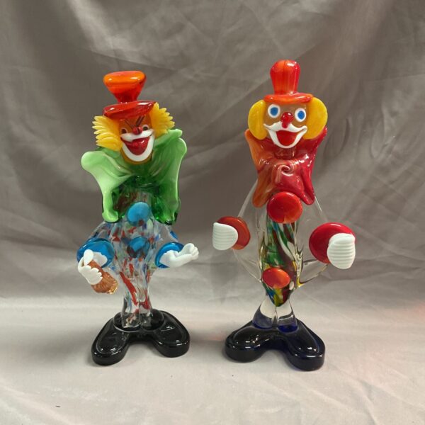 Pair of vintage Murano glass clowns with colourful patterns.