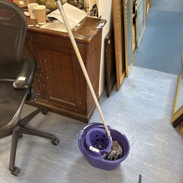 Vintage Betterware mop and bucket set for cleaning floors.