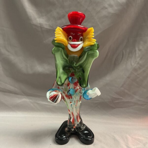 Colourful Murano glass clown with harlequin pattern.
