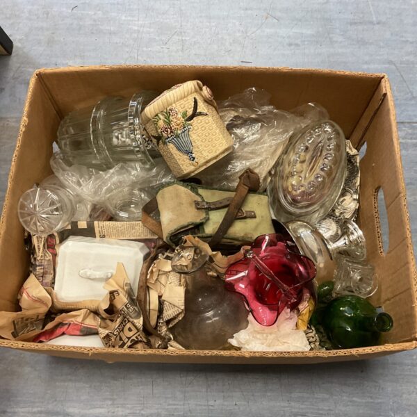 Mixed lot of vintage porcelain and glassware collectibles on display.