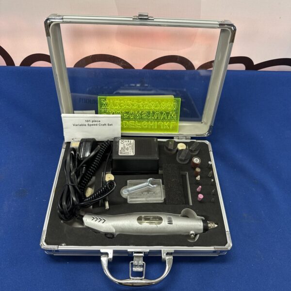 Mini rotary tool set in a fitted carrying case with various attachments.