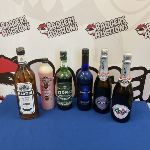 Mixed lot of alcohol bottles including Asti champagne and Martini Blanco.