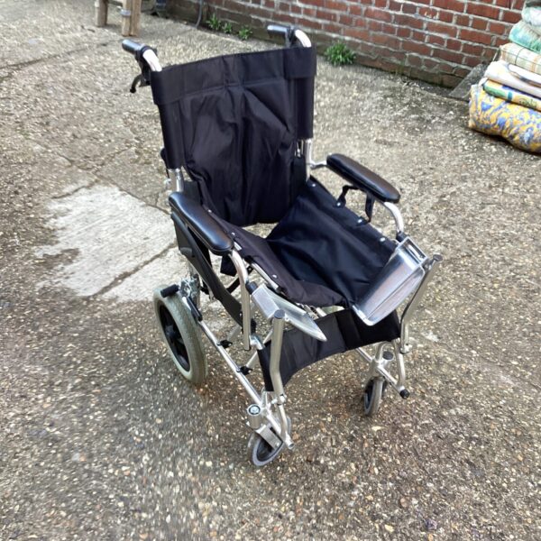 Silver folding wheelchair with black padded seat and backrest.