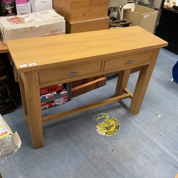 Rustic solid oak side table with a single drawer.