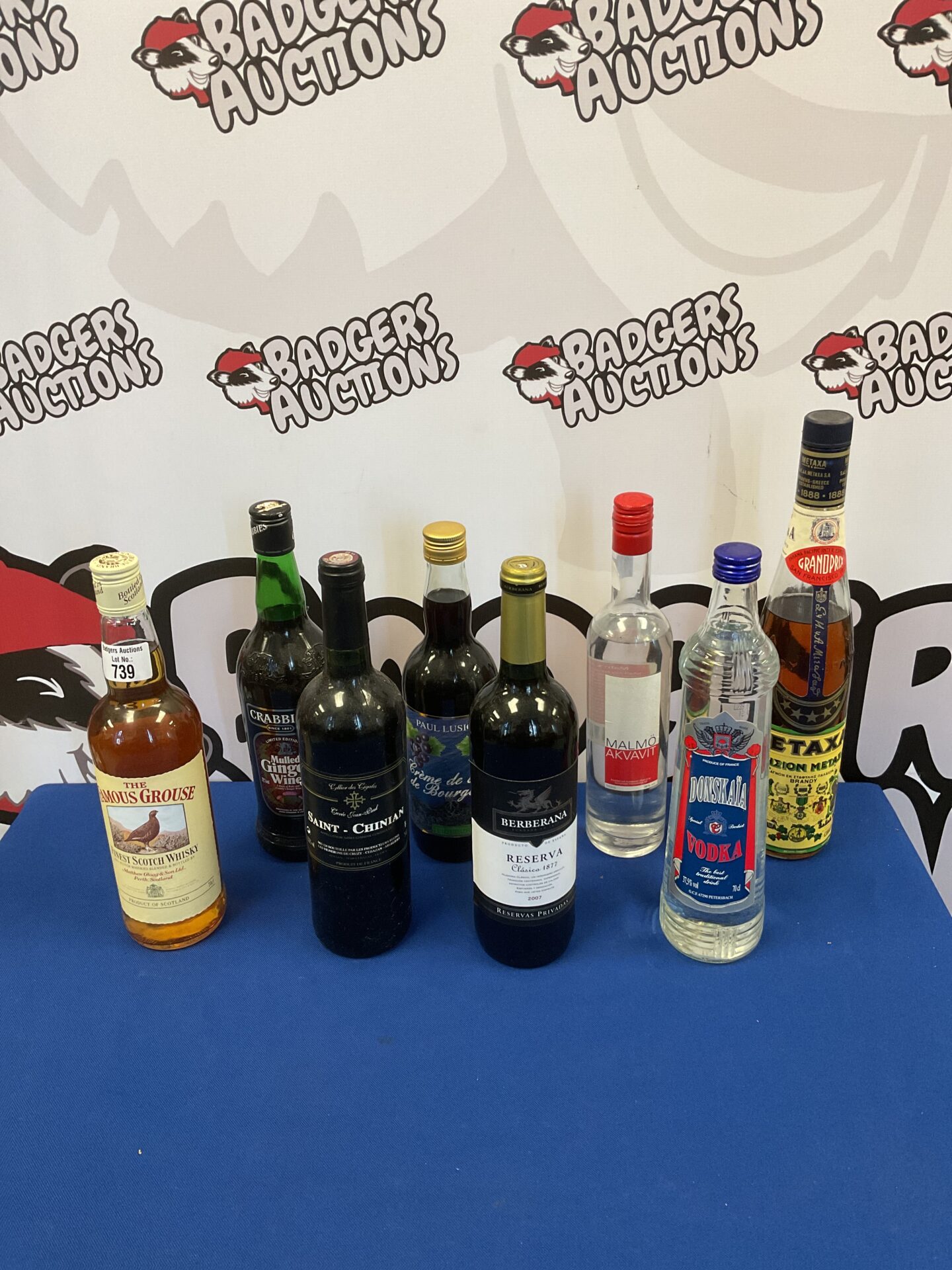 739 Eight bottles of alcohol including famous grouse whisky