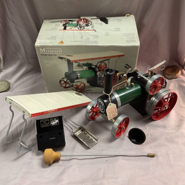 Vintage Mamod steam tractor in original box, collectible steam engine.