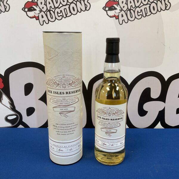 Sealed bottle of Six Isles Reserve Scotch whisky for collectors.