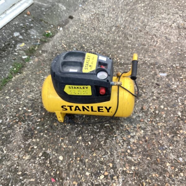 Vintage Stanley air compressor for workshop or garage use.