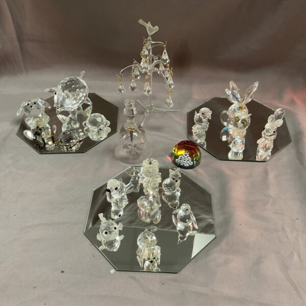Stunning Swarovski crystal animal collection with a fruit tree centerpiece.
