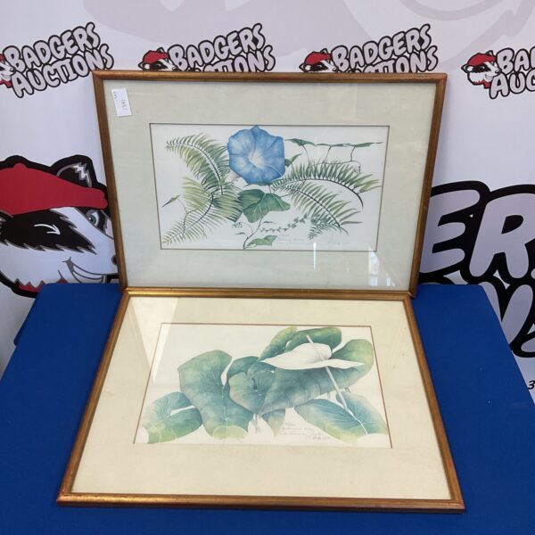 Signed pair of limited edition botanical lily prints for floral art collectors.