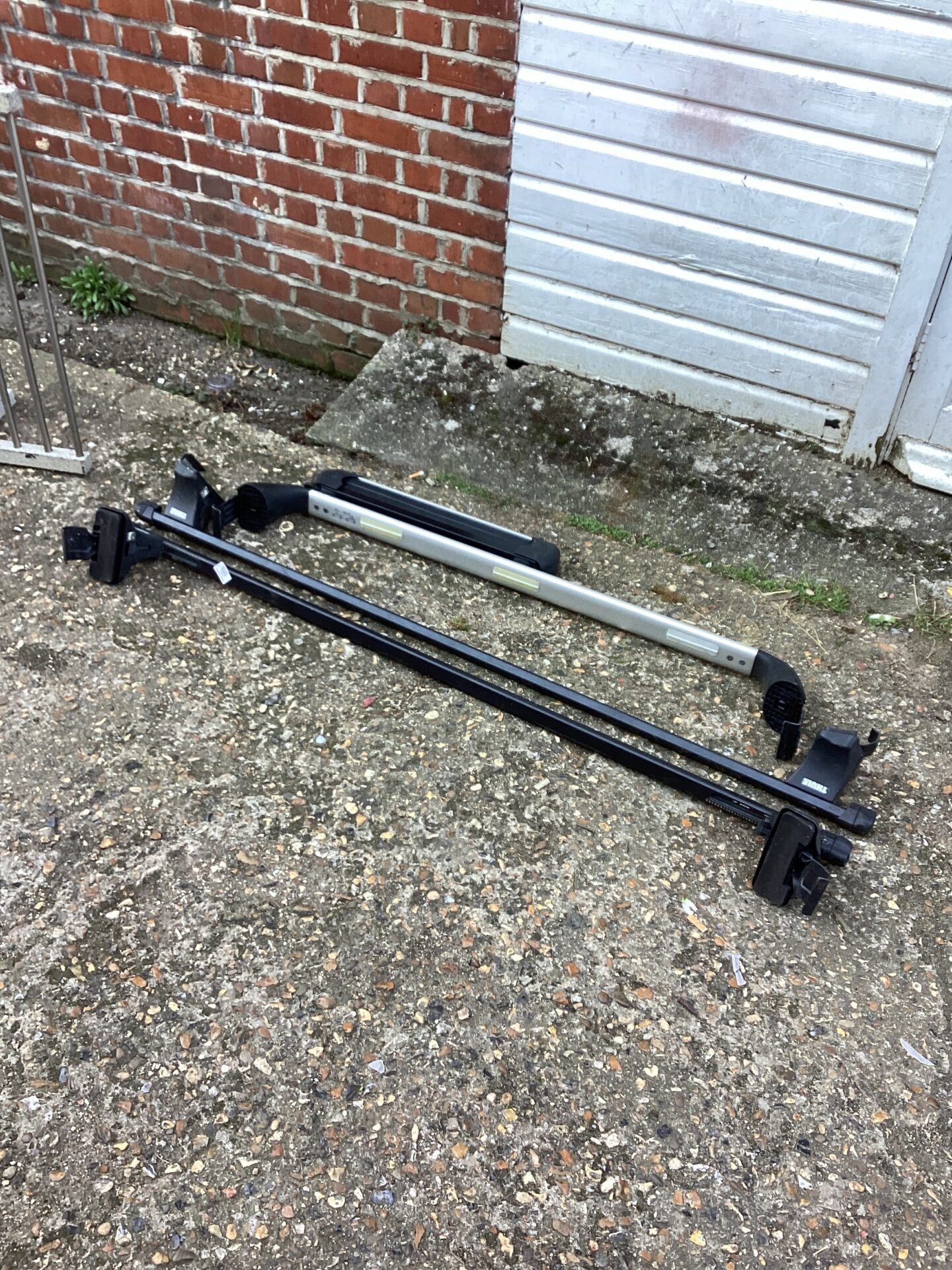 1255 Pair of Thule roof bars plus one other