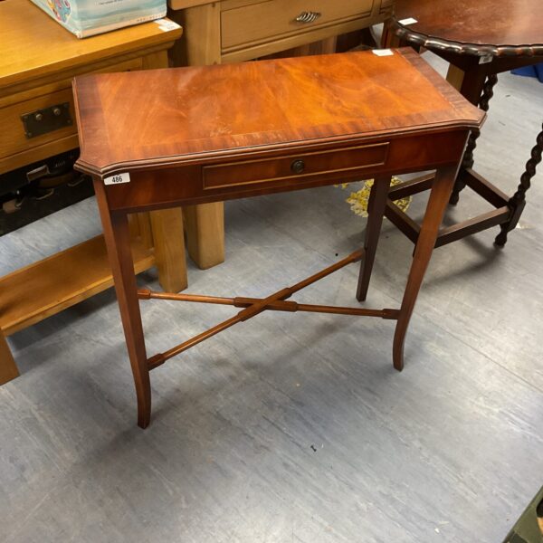 Elegant antique mahogany console table with a single drawer.