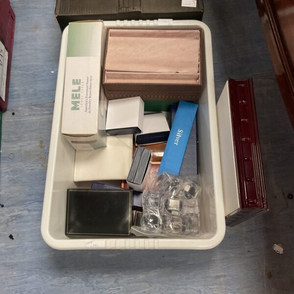 Lot of empty jewellery boxes for display and storage.