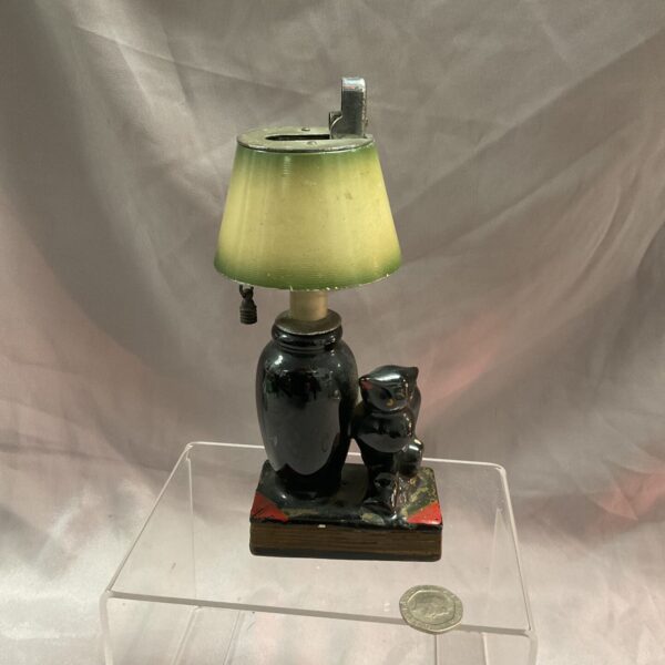 Vintage black cat lamp lighter with translucent shade.