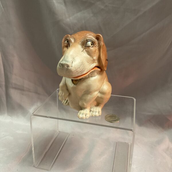 Vintage bisque dog pot with lid, collectible ceramic figurine.