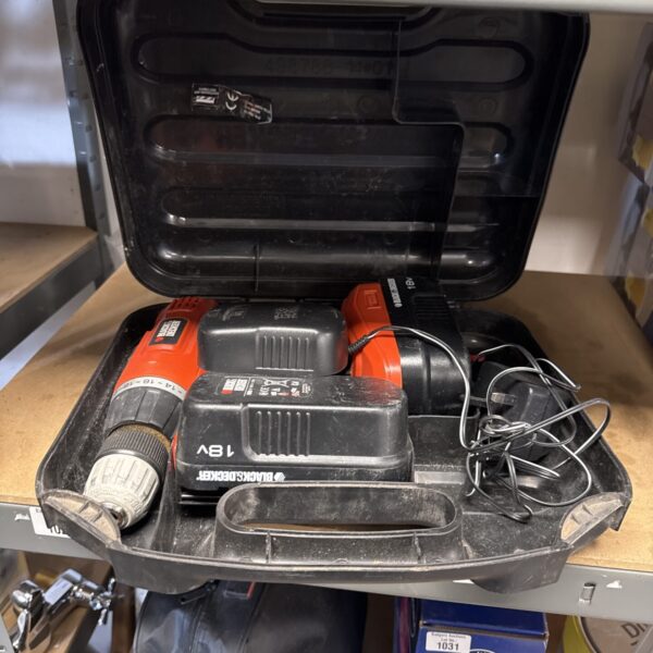 Vintage Black & Decker cordless drill in its original case.