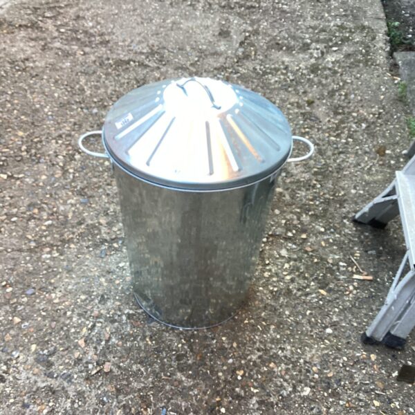 Small galvanised bin with lid and handles, vintage garden storage.