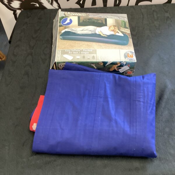 Flocked inflatable mattress for camping or guest use.