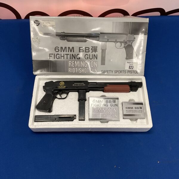Vintage Hua Chiao Remington Riot 6mm BB gun in box.