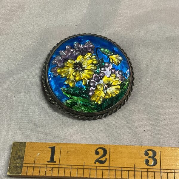 J Brevere Paris enamel brooch with floral design.