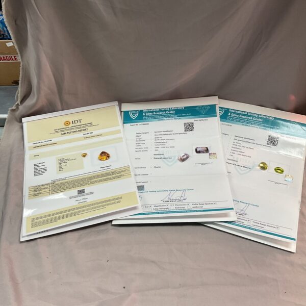 Gemstone certificates for citrine, ametrine, and lemon quartz.