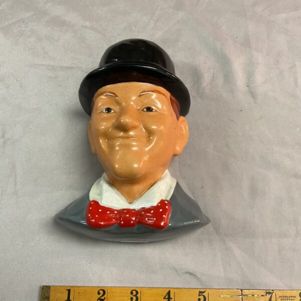 Vintage ceramic Stan Laurel wall mount figure, Laurel and Hardy collectible.