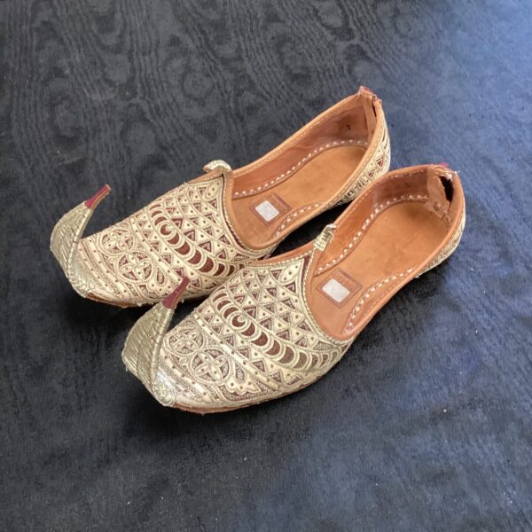 Intricate embroidered leather eastern style slippers, vintage footwear.