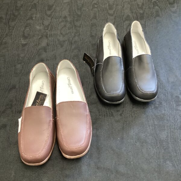 New pair of Clifford James size 7 slipper shoes for indoor comfort.