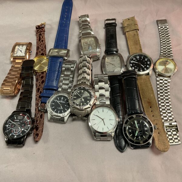 Assorted wristwatches lot featuring various styles and designs.