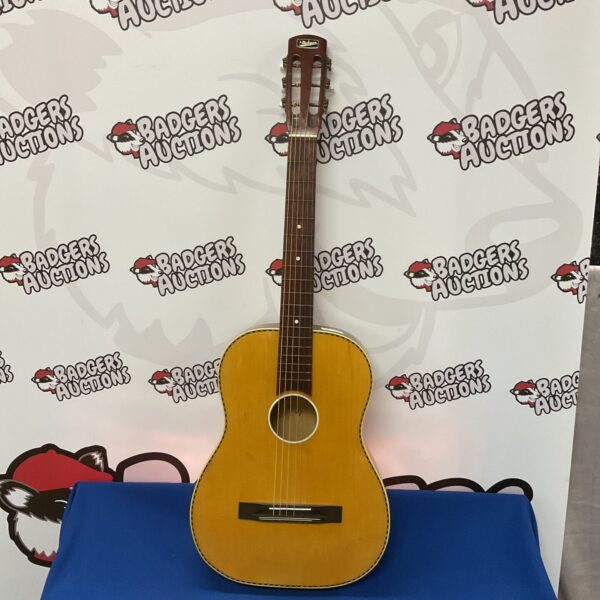 Vintage Michigan acoustic guitar with sunburst finish.