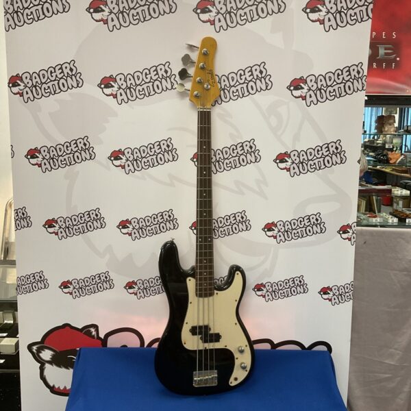 Black Gould bass guitar, vintage electric instrument for sale.