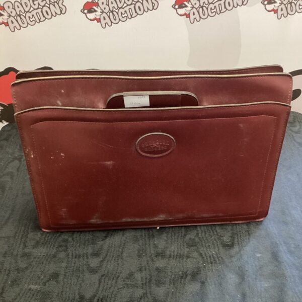 Vintage Canadian Express leather bag in brown, showing wear.