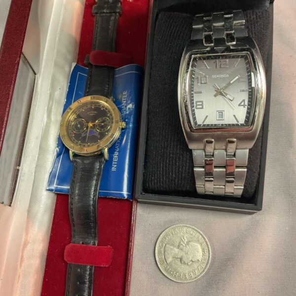 Rotary Gents Quartz watch with Seconda branding and two shilling coin.