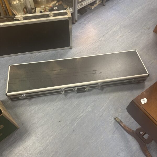 Silver aluminium rifle transit case with combination locks.