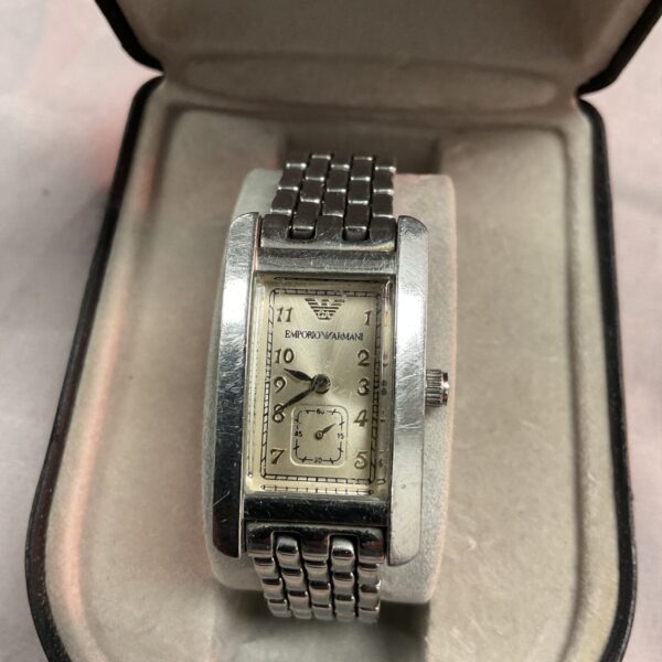 Silver tone Emporio Armani ladies wristwatch with analogue display.