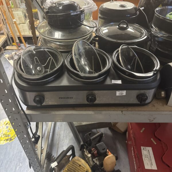 Progress triple crock pot warmer for serving food.
