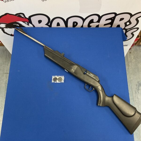 Umarex 850 air rifle on a blue background.