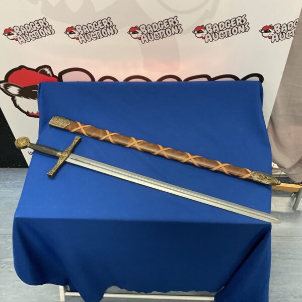 Detailed Excalibur replica sword for collectors and display.