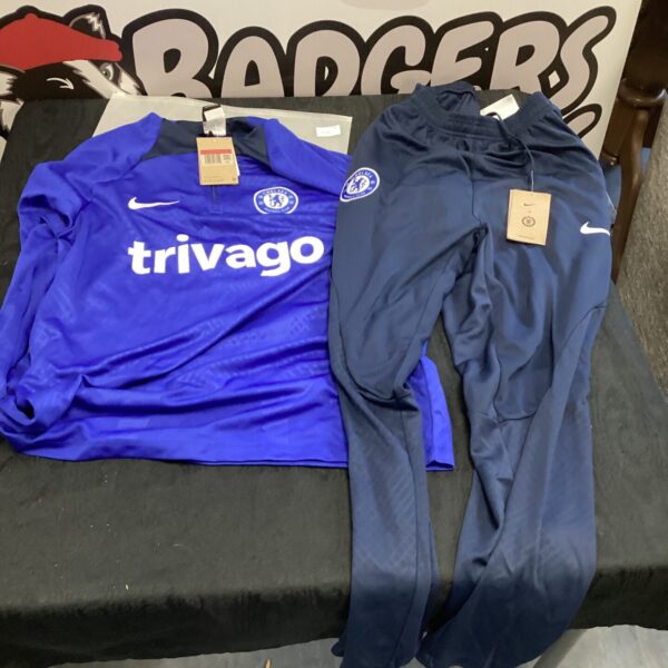 Blue Chelsea Nike tracksuit set for football training.