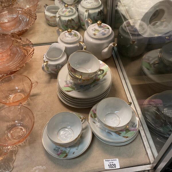 Full vintage geisha teaset with teapot and cups.