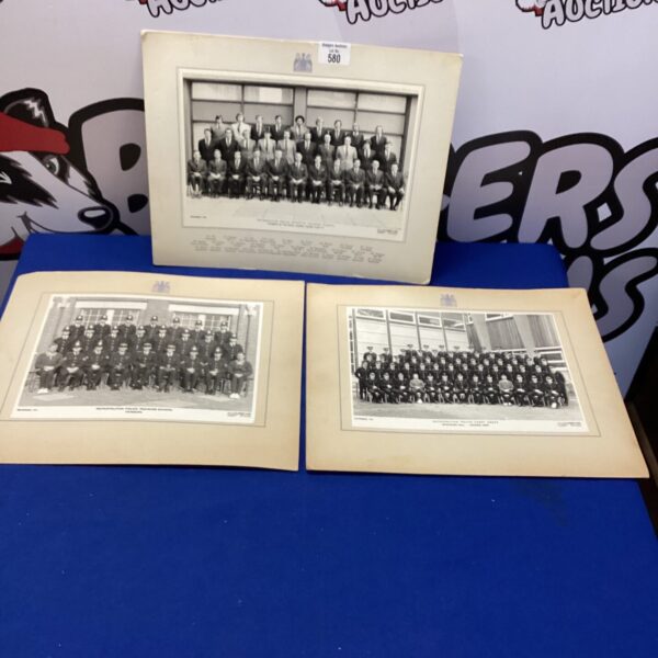 Vintage police group photograph, mid-20th century law enforcement portrait.